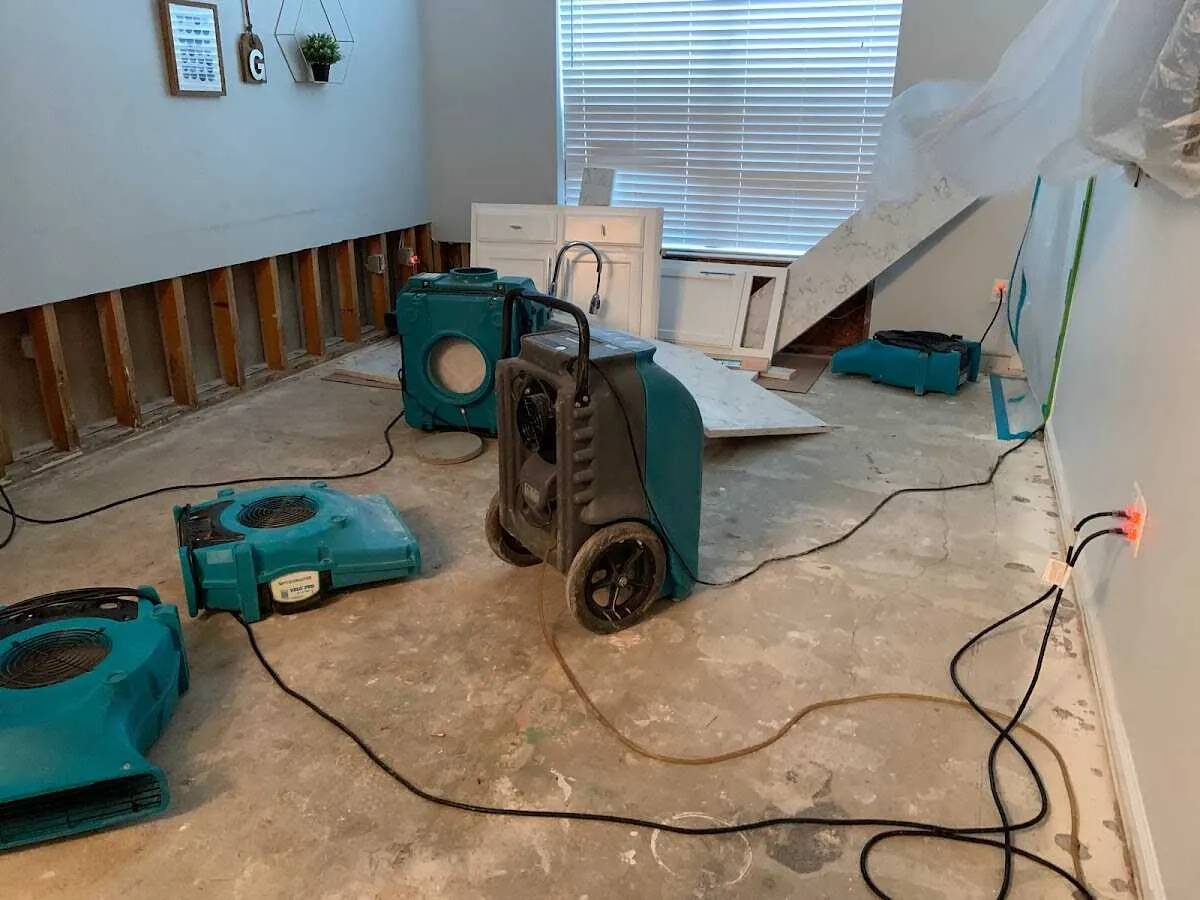 Dehumidifier in flood-cut room for Water Damage Restoration in Rockwall